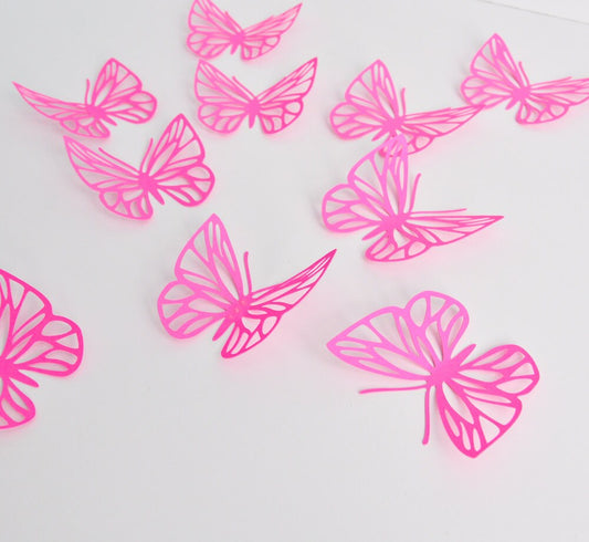 Large fuchsia pink cardstock butterflies for baby shower wall decor