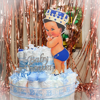 Royal blue baby prince centerpiece on a diaper cake for a boy baby shower