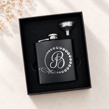 Personalized black hip flask laser engraved with monogram initial B, with stainless steel funnel in a black gift box