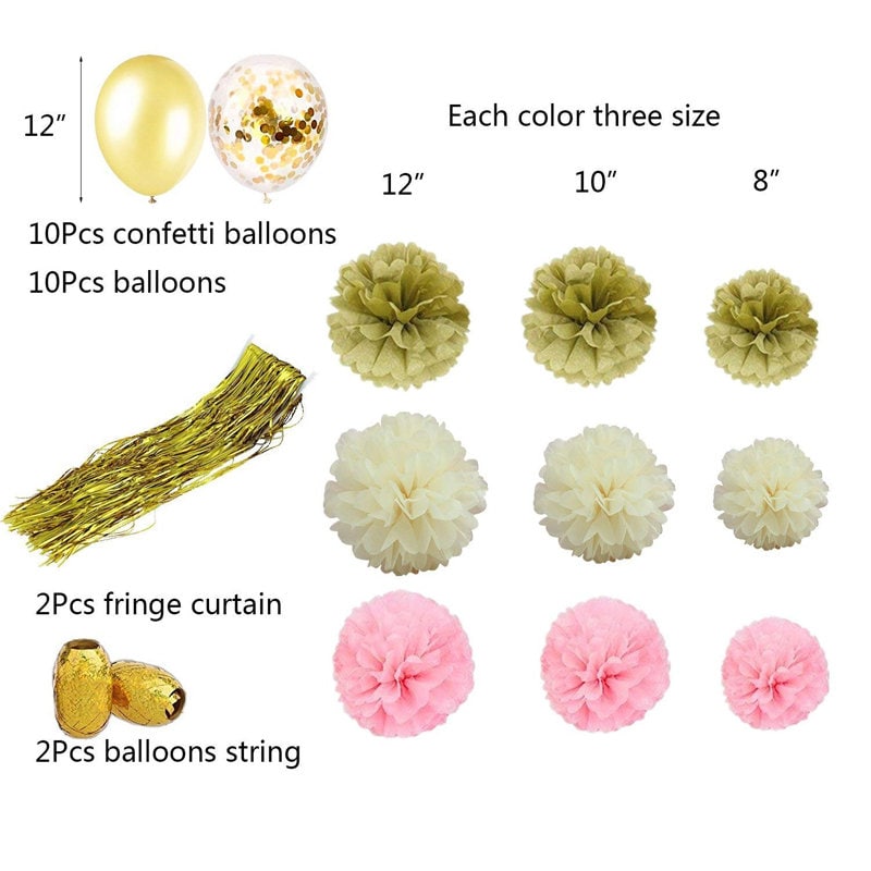Complete set of gold and pink party decorations, including fringe curtains, assorted balloons, and paper flowers, laid out for a baby shower.
