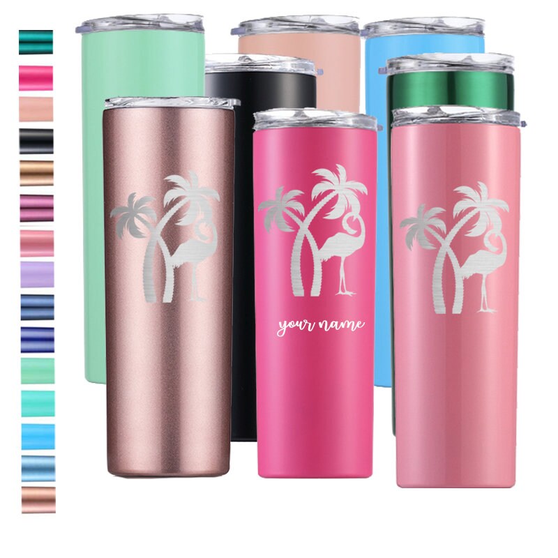 Lineup of multicolor personalized flamingo tumblers with silver palm design and finish swatches.