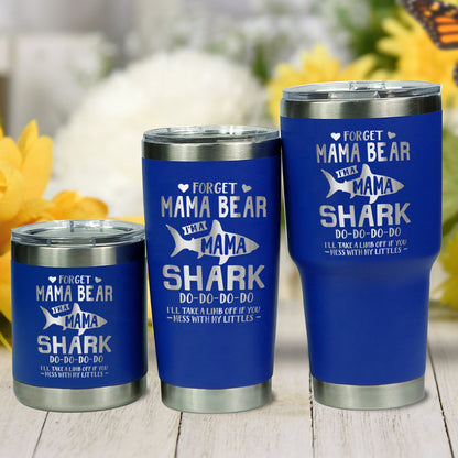 Personalized Shark Mama tumbler set in blue, photographed outdoors beside yellow flowers.