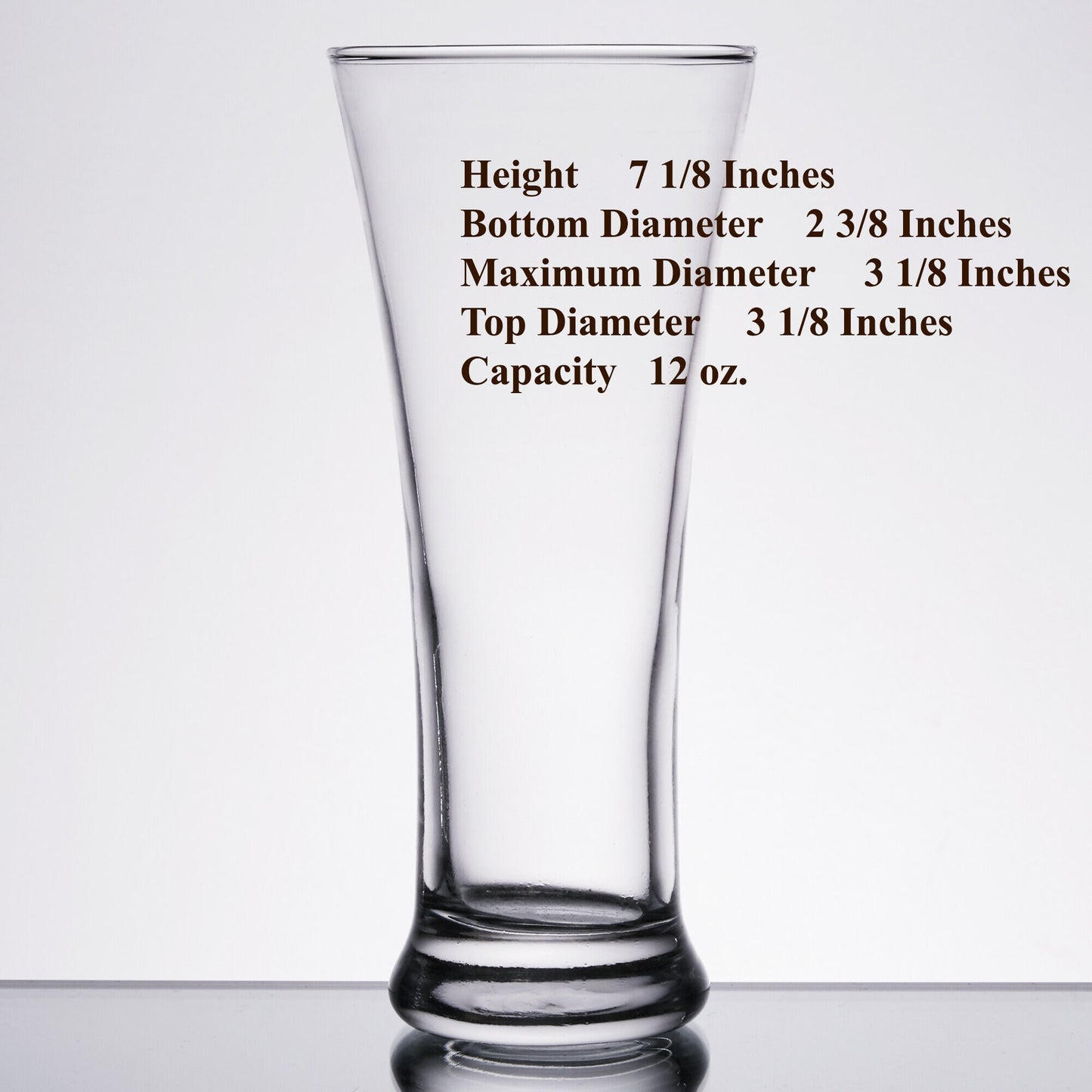 Personalized pilsner beer glass filled with amber beer, showing how the custom engraving appears in use.