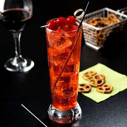 16.25 oz pilsner cooler glass with red cocktail and cherries, shown as a highball and cocktail glass