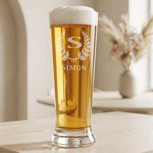 Personalized 16.25 oz pilsner beer glass laser engraved with monogram S in a laurel wreath and the name Simon