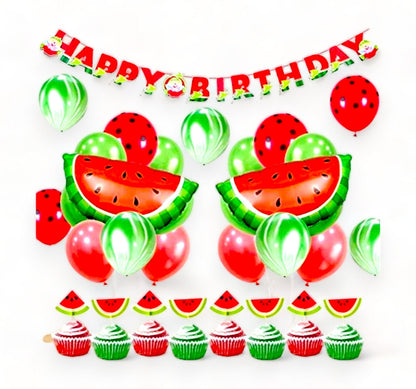 Two large, vibrant watermelon-shaped foil balloons, a key decorative element from the party kit.