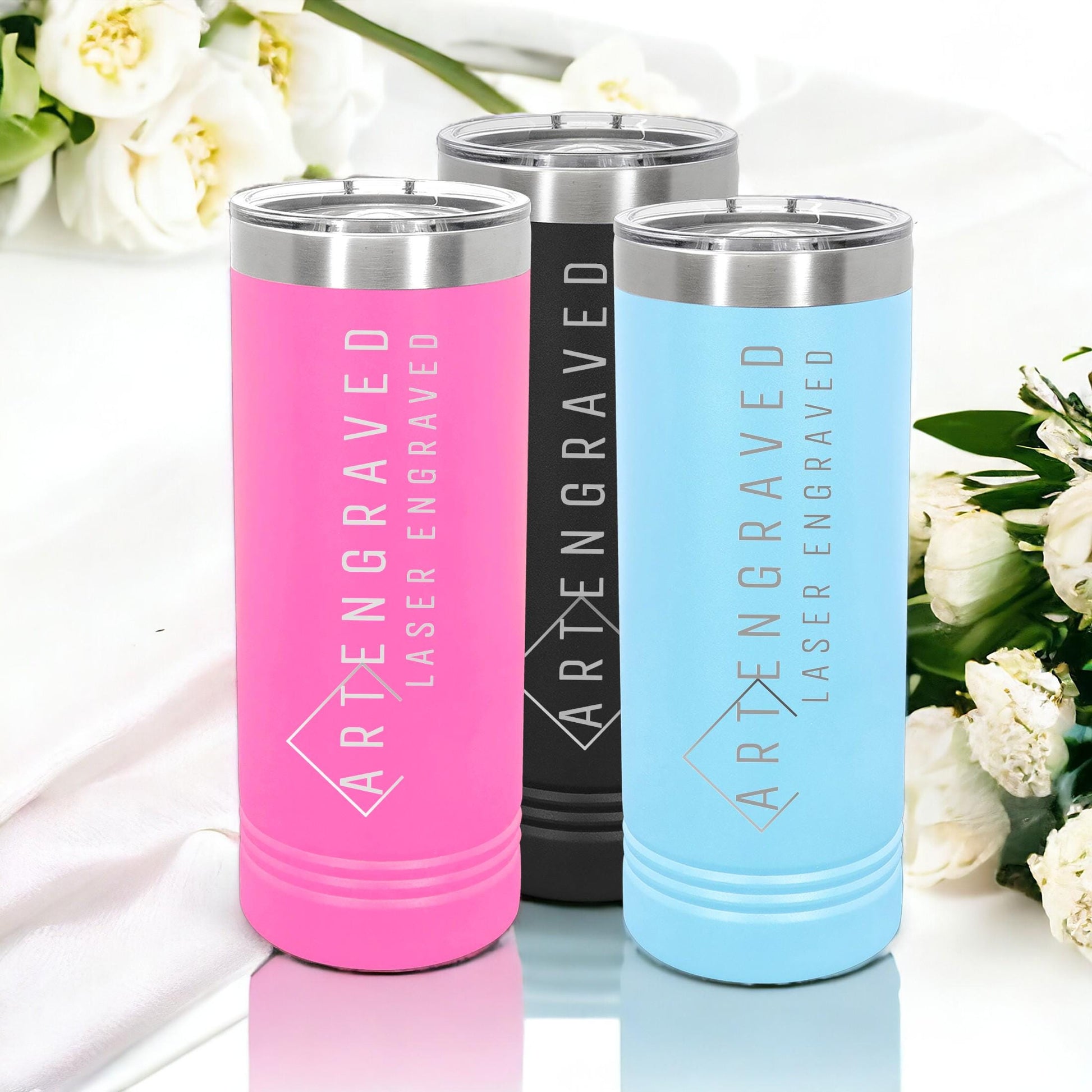 Lifestyle shot of a custom logo tumbler on an office desk, illustrating its use as office decor.