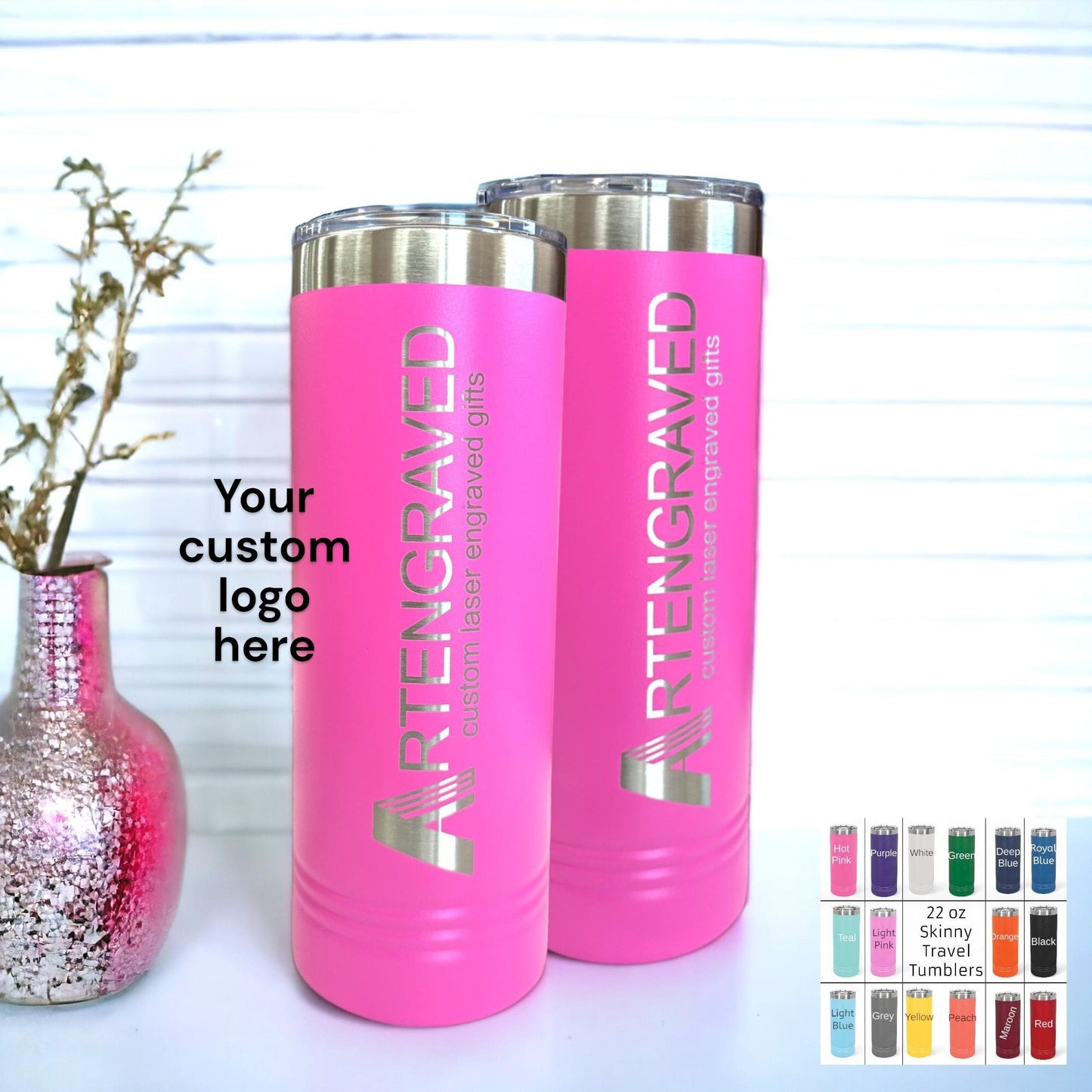 Various colored 22 oz stainless steel tumblers with custom business logos displayed on a shelf.