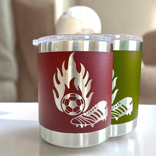 Close-up of a laser engraved tumbler with soccer theme and custom name option