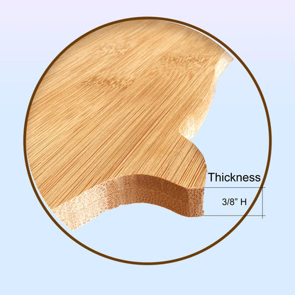 Cow-shaped bamboo cutting board, ready for personalization, ideal for a farmhouse kitchen.