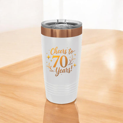 Detail view of the permanent laser engraving on a white personalized milestone birthday tumbler, showing crisp text.