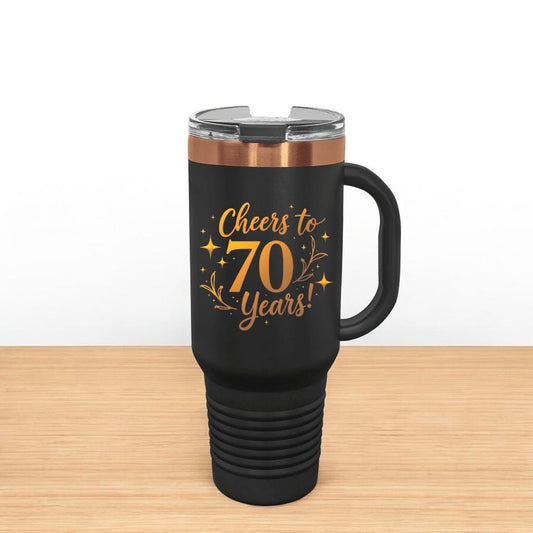A white 40 oz personalized birthday tumbler with a handle and gold laser engraving, displaying a 'Happy 30th Birthday' message.