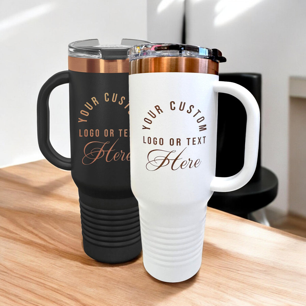 Comparison view of the black and white custom engraved crow 40 oz tumblers.