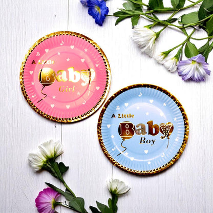 Collection of blue and pink gold foil baby shower plates, neatly stacked for easy party setup.