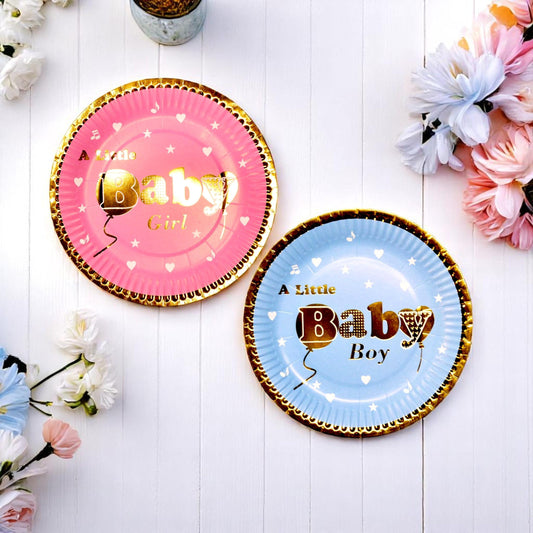 Stack of blue and pink gold foil baby shower plates with elegant designs, ideal for gender reveal parties.