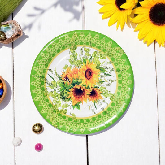 Stack of rustic sunflower dessert paper plates with a woodgrain background, ideal for parties.