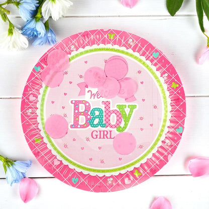 Stack of 'Welcome Baby Girl' pink floral paper plates, 7-inch size, perfect for baby shower desserts.