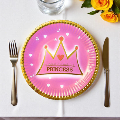 Close-up of a single 7-inch pink paper dessert plate with a glittery gold crown and star details.