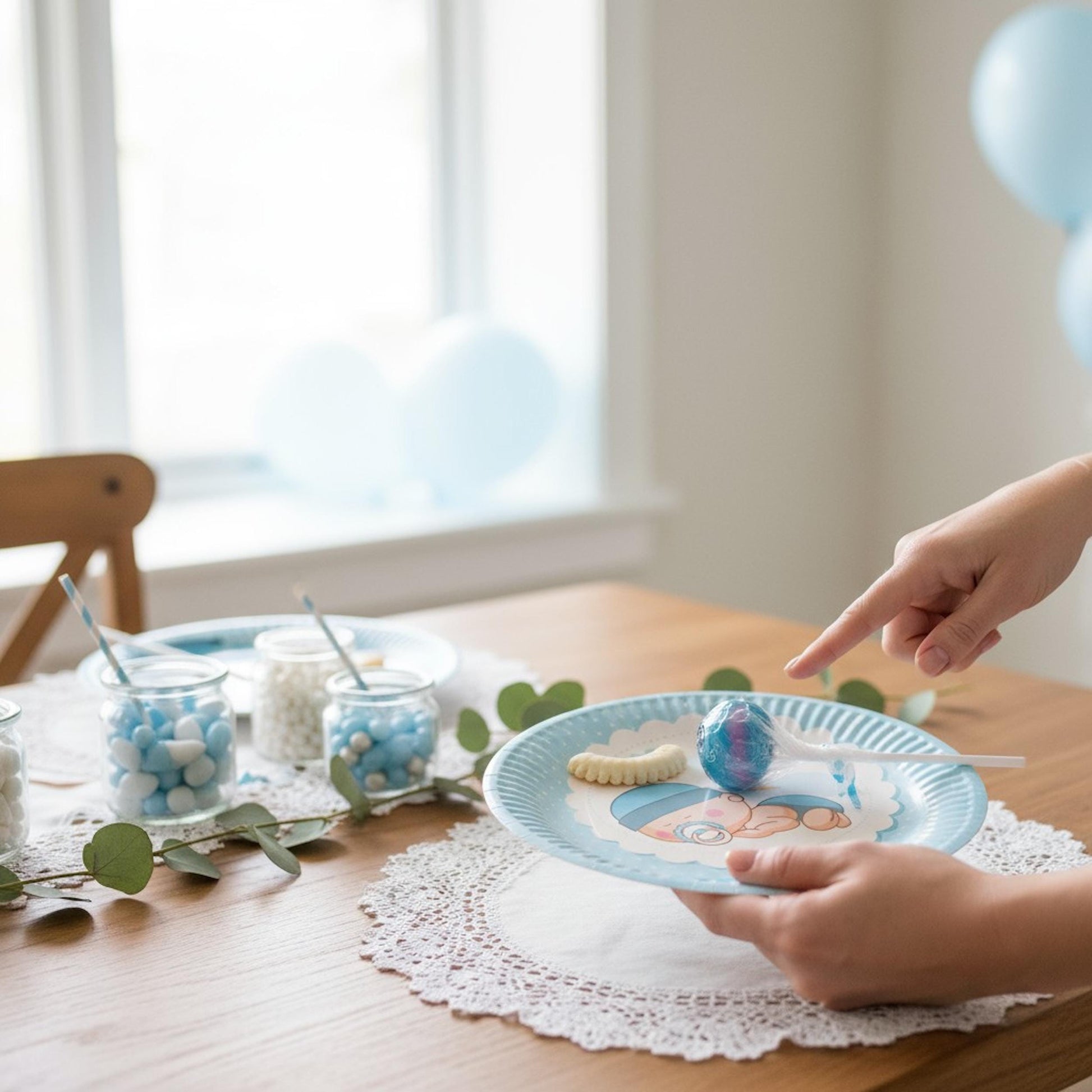 Close-up of a single blue sleeping baby boy dessert plate, featuring a sweet baby dreamily sleeping.