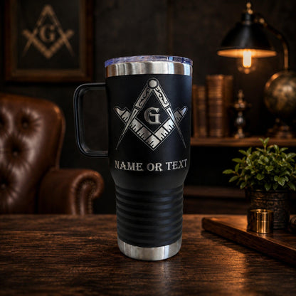Sleek stainless steel Freemason tumbler with an intricately etched compass and square design.