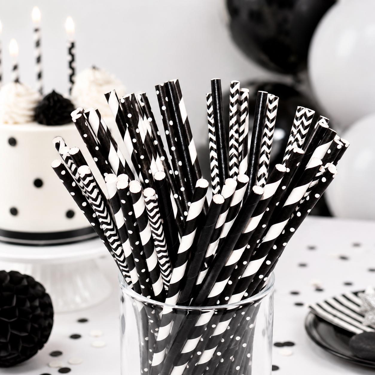 Set of 50 black paper straws, neatly bundled and ready for use as party supplies.