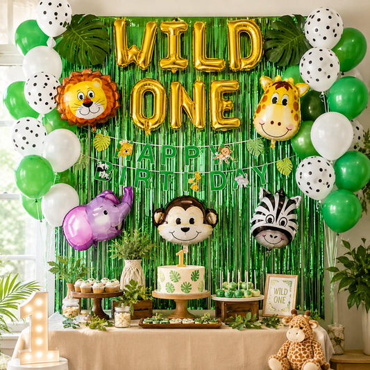 Wild one balloons set with gold foil letters and green latex balloons for a safari first birthday.