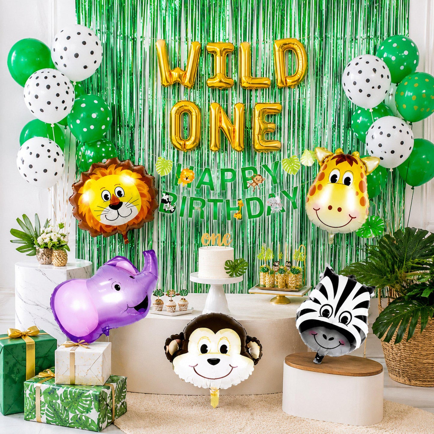 Close-up of the charming zebra and giraffe animal head foil balloons, perfect for a jungle-themed party.