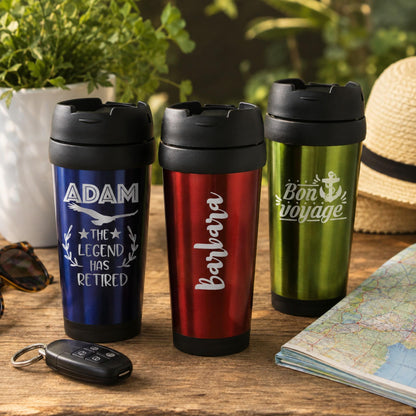 Engraved stainless steel travel mug in green, navy blue, and red with a screw-on lid.