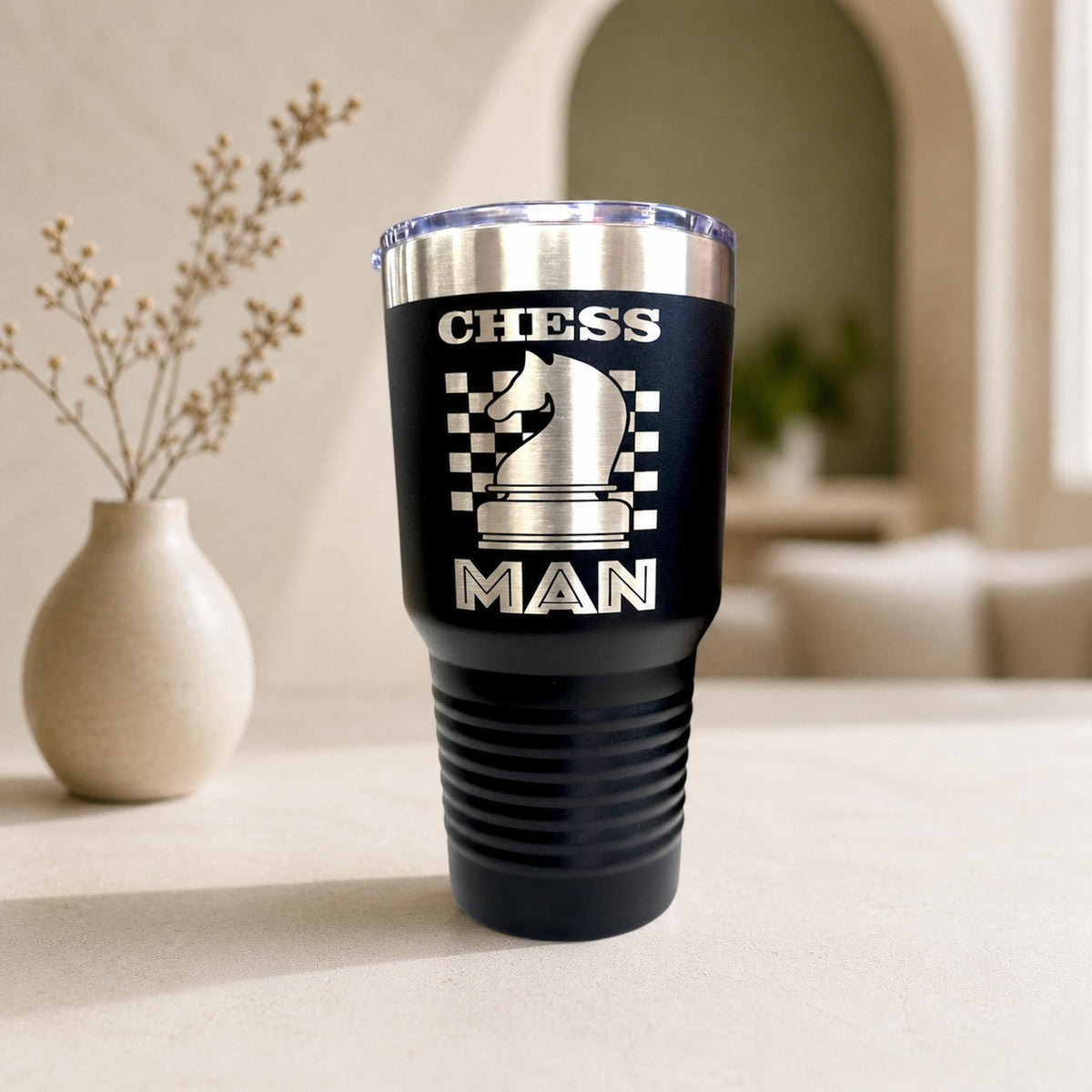 30 oz laser engraved chess tumbler in stainless steel with a secure slider lid, showing a detailed chess board pattern.