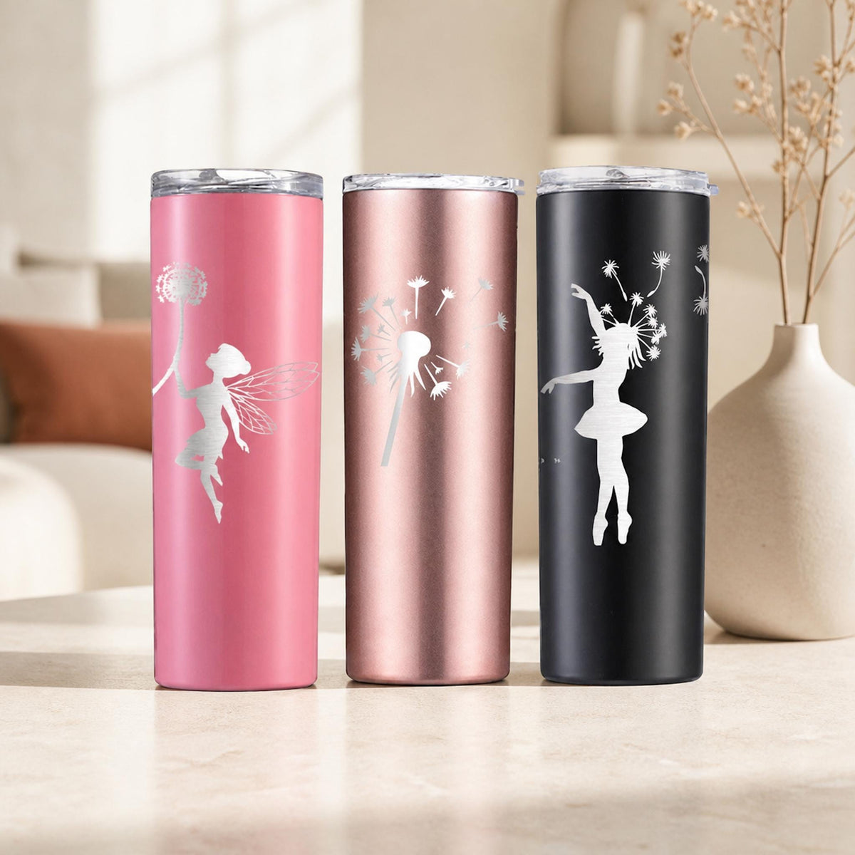 Personalized fairy tumbler trio in pink, rose, and black with white engraved fairy silhouettes.