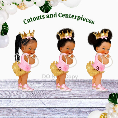 An African American princess table centerpiece in pink and gold, featuring a ballerina design.