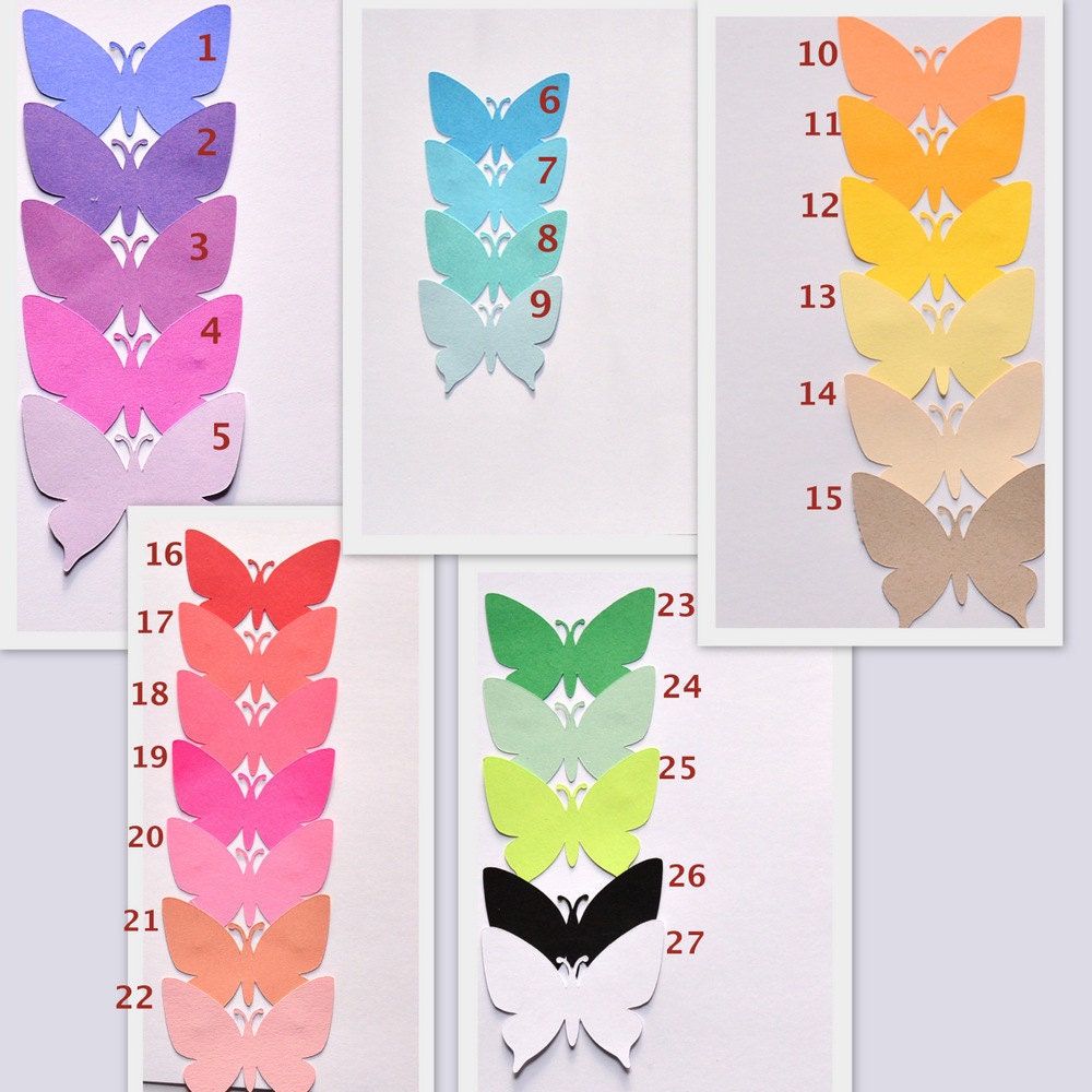 pink butterfly party decoration with layered cardstock wings