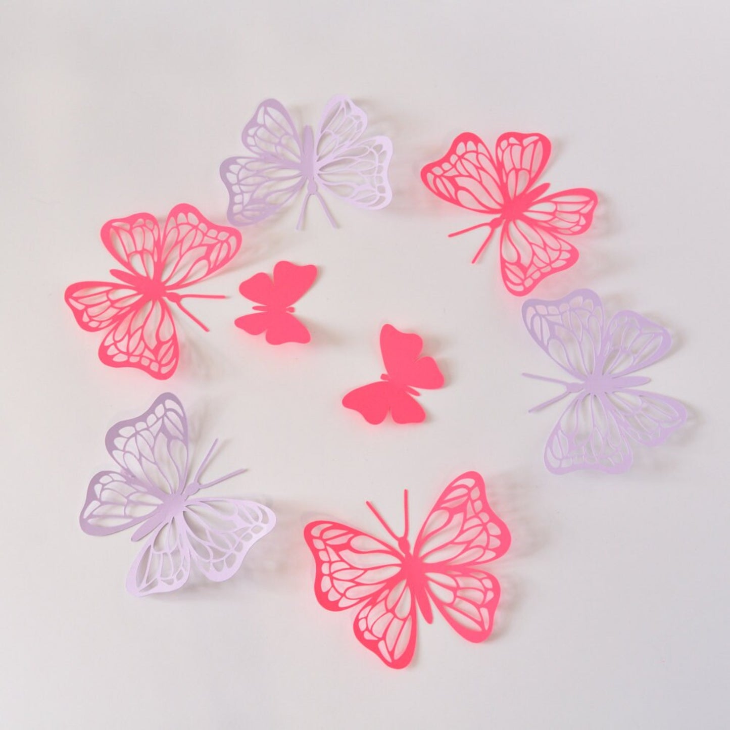 Lilac and red paper butterfly wall decor set arranged as layered 3D wall accents