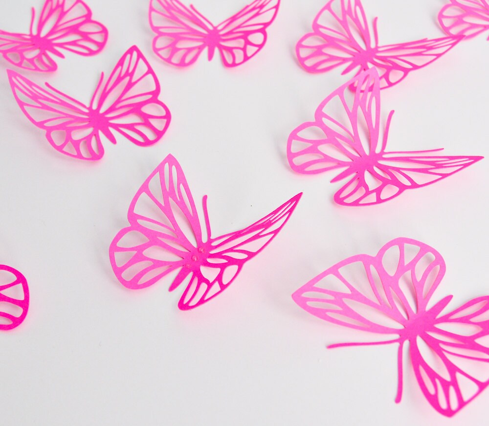 Fuchsia pink paper butterfly wall decals set of 16 on white background